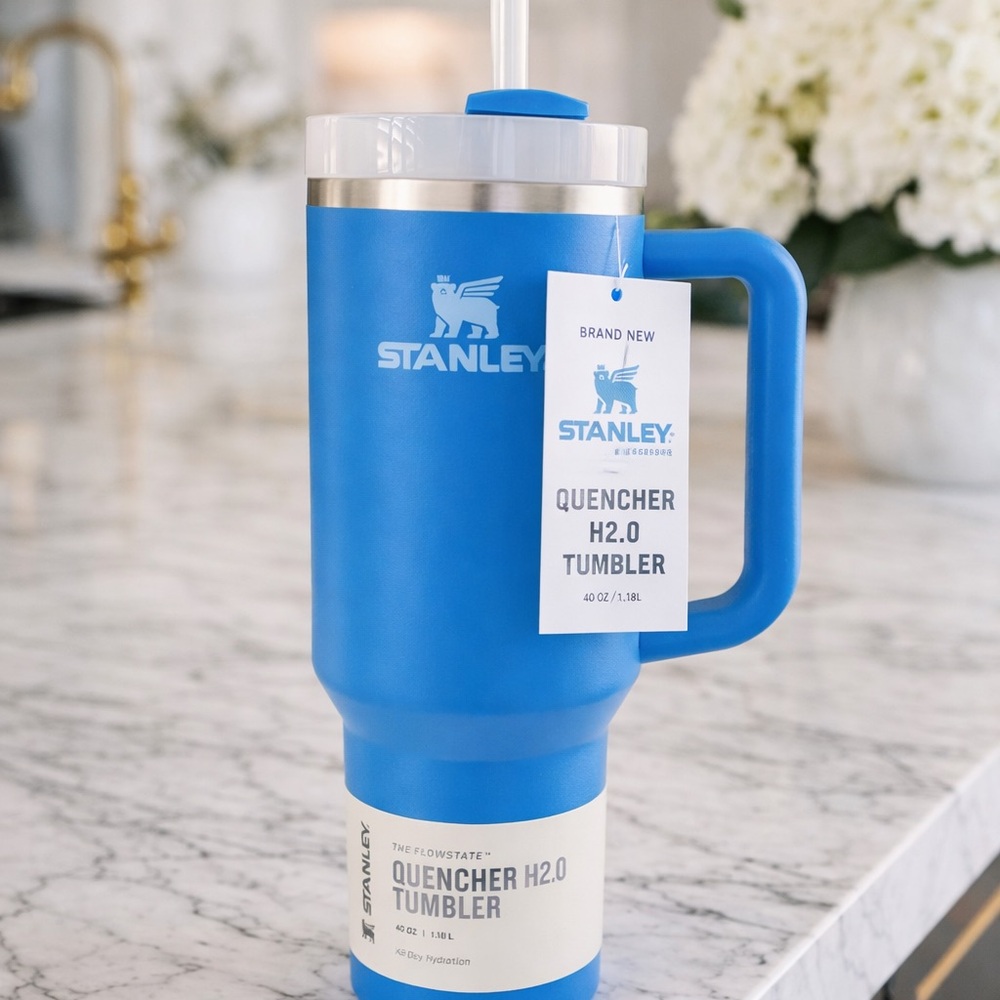 Stanley Vibrant Blue, lavender, orange, splash, light greenish Quencher Tumbler